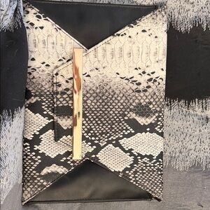 Snakeskin print black and white clutch